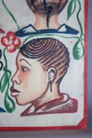 Painted by Joel in Adjame, Abidjan, 4 women's heads on a white background, lower right portrait