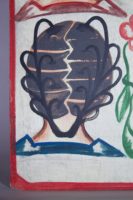 Painted by Joel in Adjame, Abidjan, 4 women's heads on a white background, lower left portrait